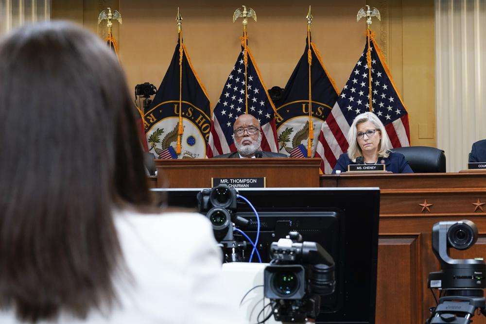 Chairman Bennie Thompson, D-Miss., and Vice Chair Liz Cheney, R-Wyo., listen as Cassidy Hutchinson, former aide to Trump White House chief of staff Mark Meadows, testifies as the House select committee investigating the Jan. 6 attack on the U.S. Capitol holds a hearing at the Capitol in Washington, Tuesday.