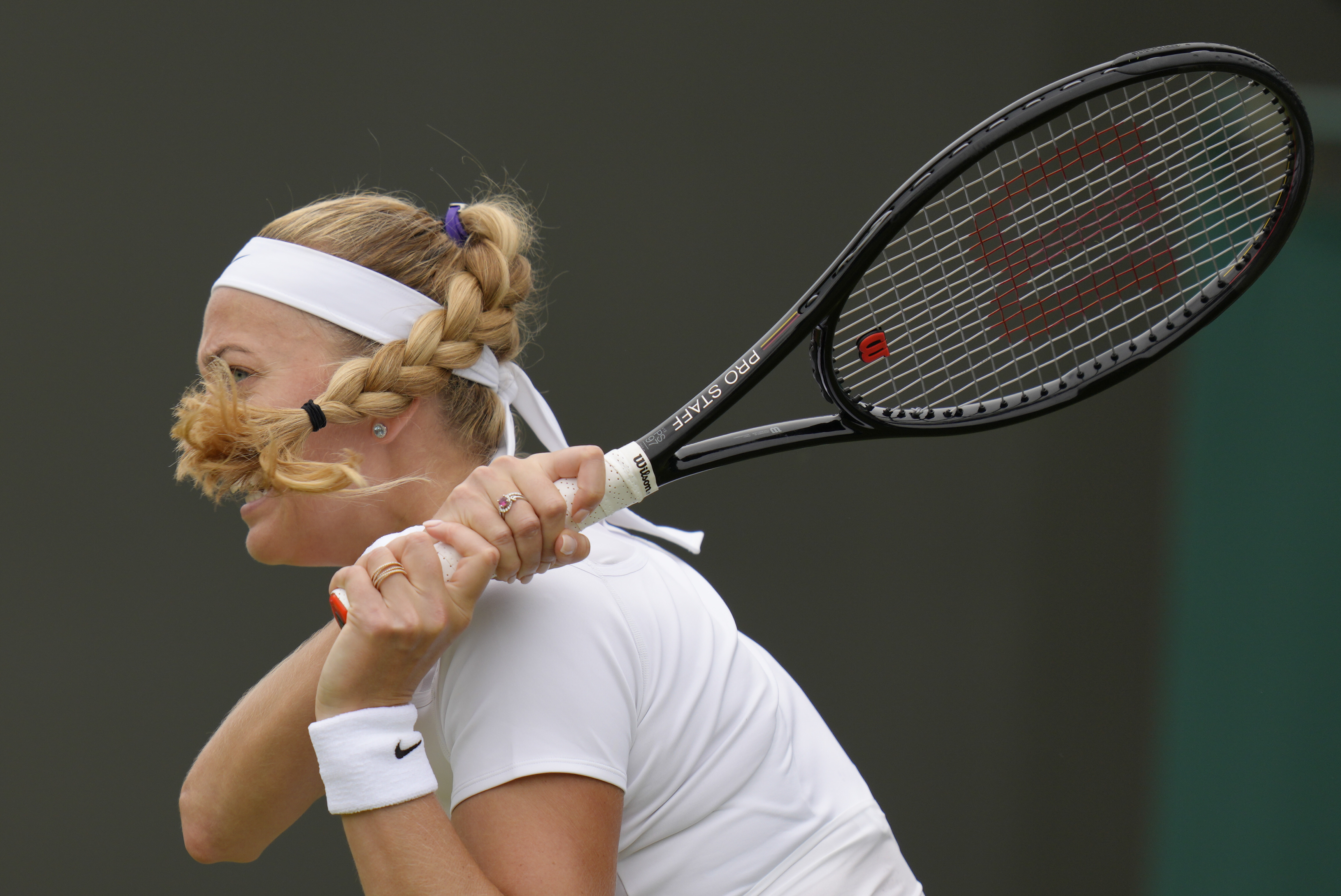 Petra Kvitova of the Czech Republic returns to Romania's Ana Bogdan in a women's singles second round match on day four of the Wimbledon tennis championships in London, Thursday, June 30, 2022.