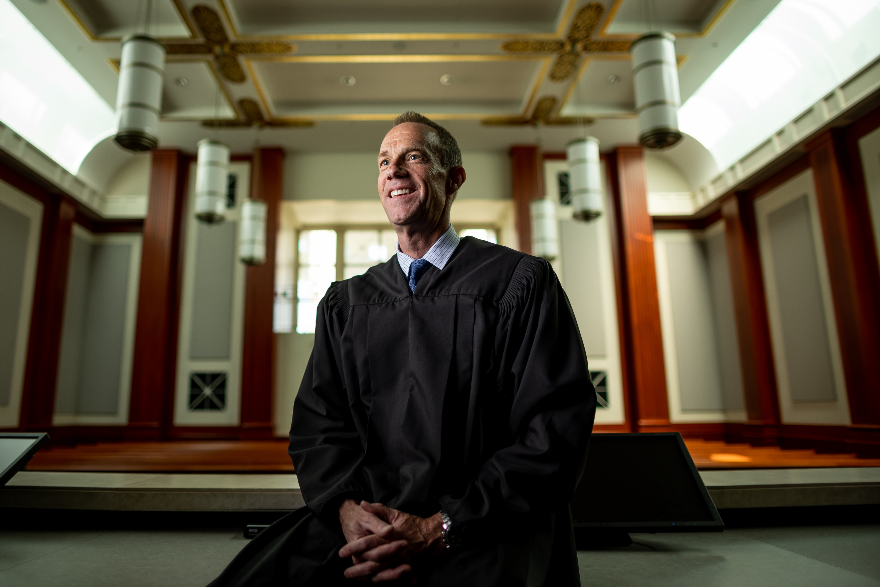 Utah Supreme Court Justice Thomas Lee poses for a photo inside the Utah Supreme Court in Salt Lake City on Friday, June 10. He retired Thursday after 12 years on the court but has plans to start two new law firms.