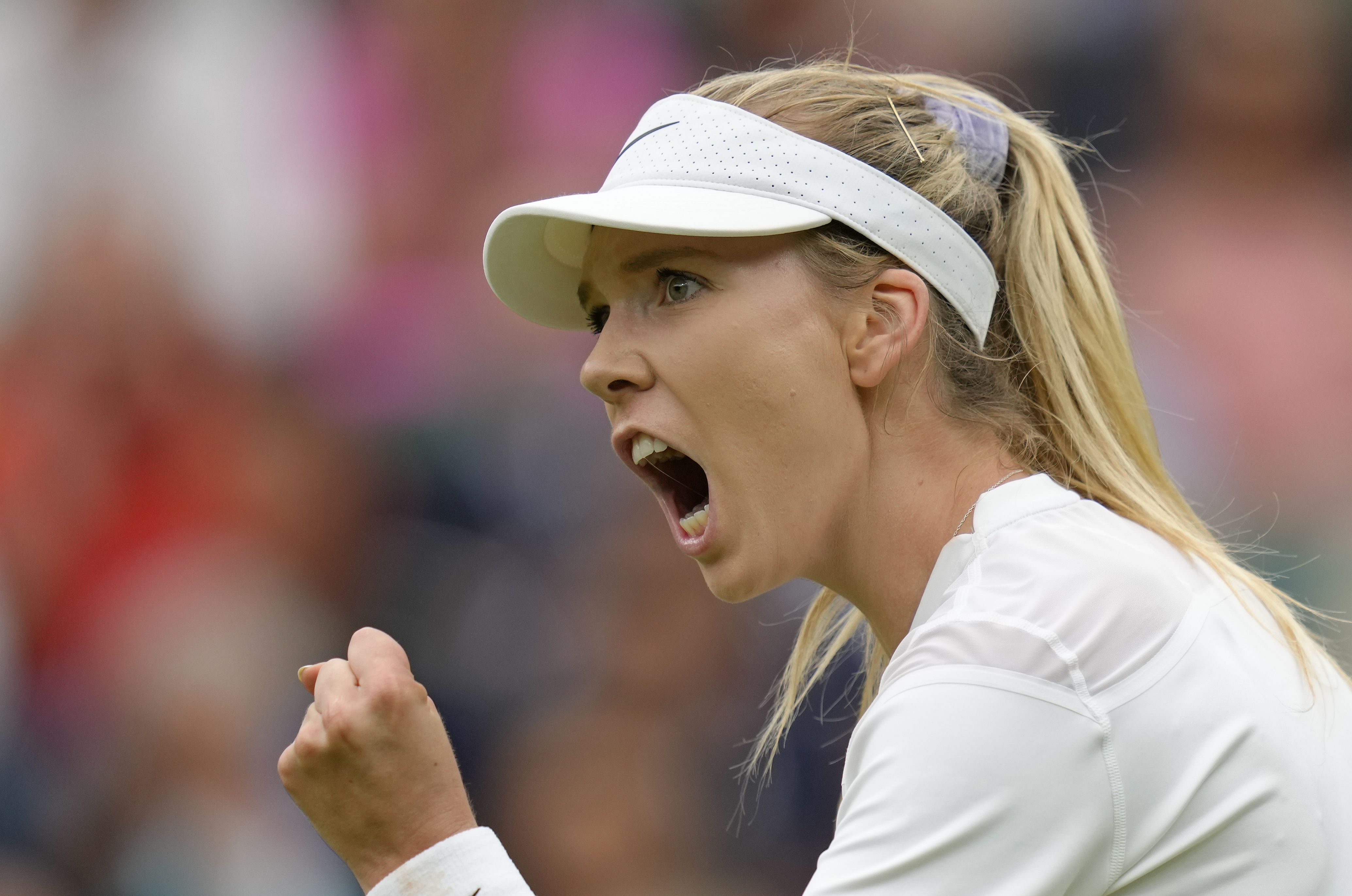 Britain's Katie Boulter celebrates after winning a point against Karolina Pliskova of the Czech Republic in a second round women's singles match on day four of the Wimbledon tennis championships in London, Thursday, June 30, 2022. 