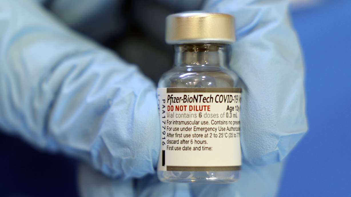 A bottle of Pfizer-BioNTech COVID-19 vaccine is pictured at a vaccine clinic at the A. Ray Olpin Student Union at the University of Utah in Salt Lake City on Jan. 20. The Biden administration has just placed a big order for more COVID-19 vaccine.