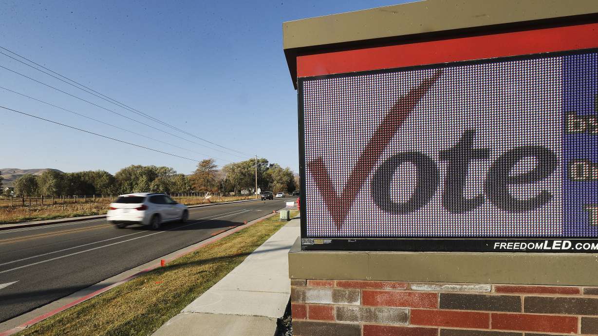 A sign at Bluffdale City Hall in Bluffdale on Nov. 3, 2020, encourages people to vote. Two recent conflicts are boiling over in Bluffdale city leadership.