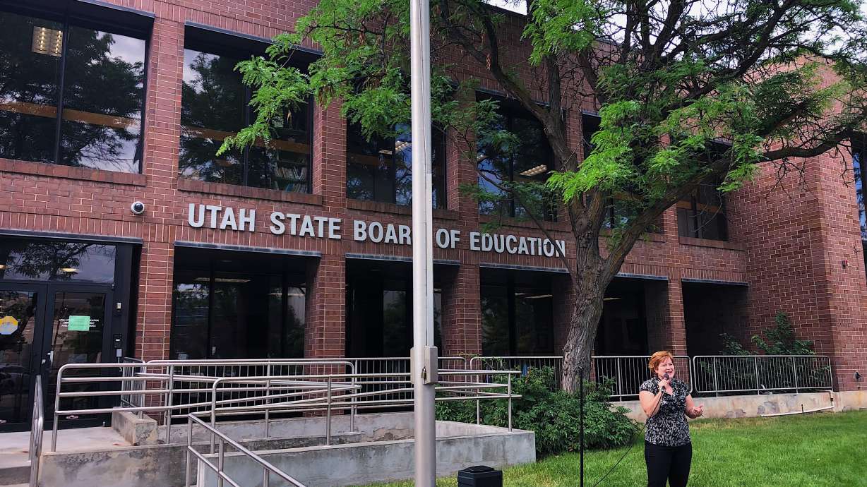 Kelly Whited Jones, teacher in the Davis School District, speaks at a rally in opposition to a school library book review policy proposed by the Utah State Board of Education in Salt Lake City on Thursday.
