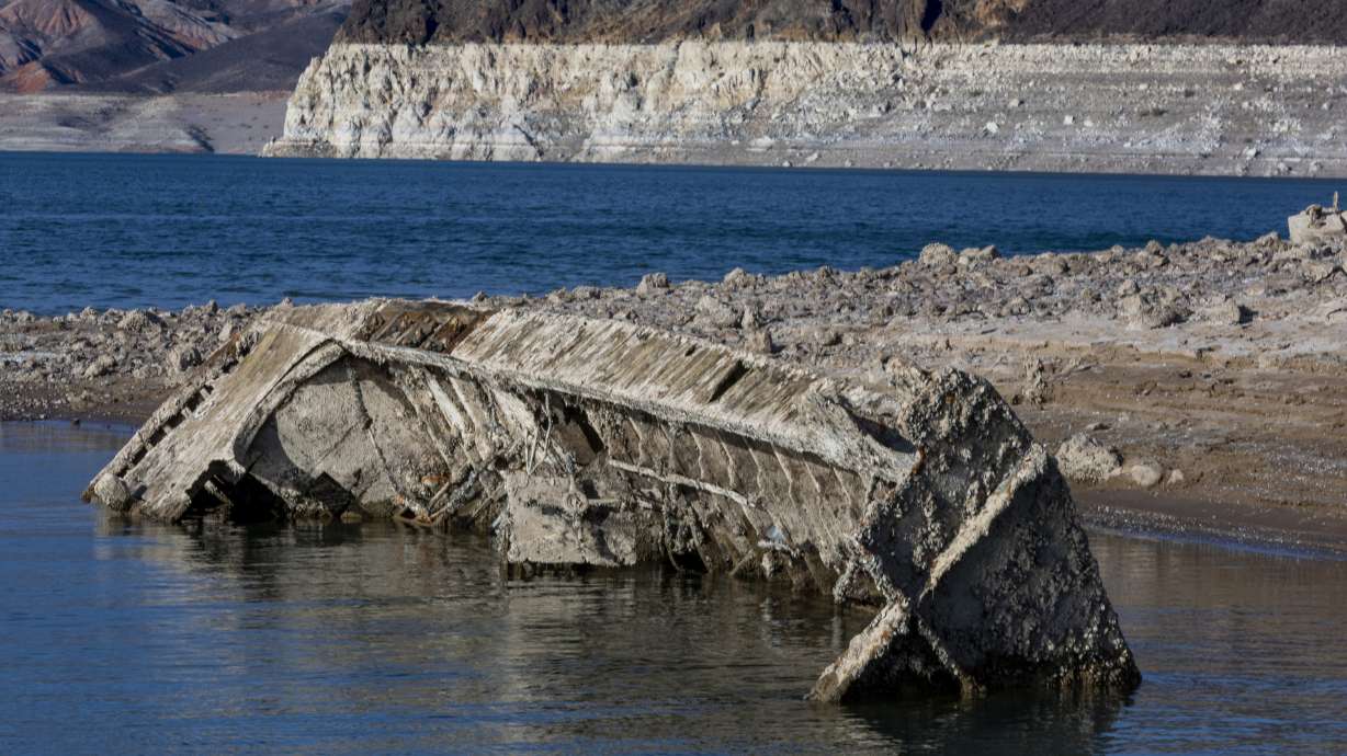 A WWII era landing craft used to transport troops or tanks was revealed on the shoreline near the Lake Mead Marina as the waterline continues to lower at the Lake Mead National Recreation Area on Thursday, in Boulder City.