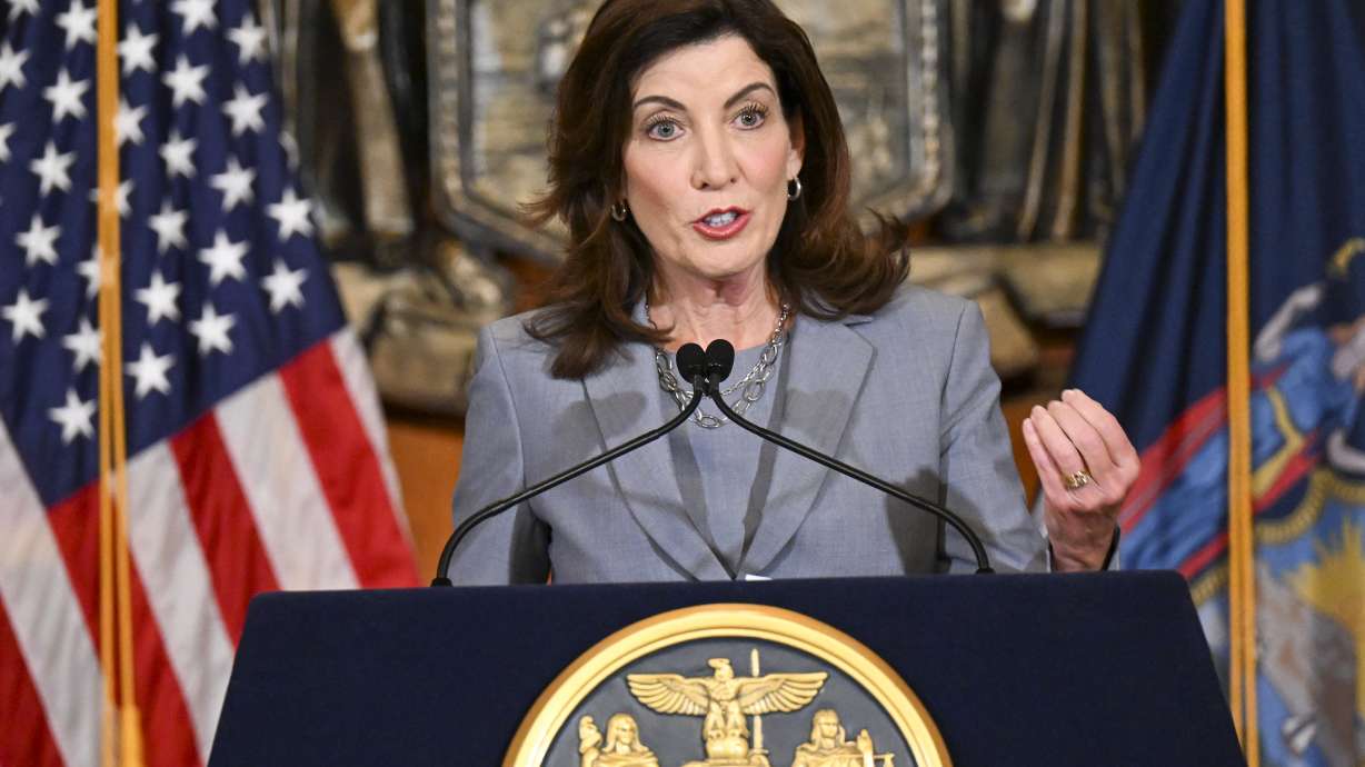 New York Gov. Kathy Hochul speaks to reporters about legislation passed during a special legislative session in the Red Room at the state Capitol, Friday, in Albany, N.Y.