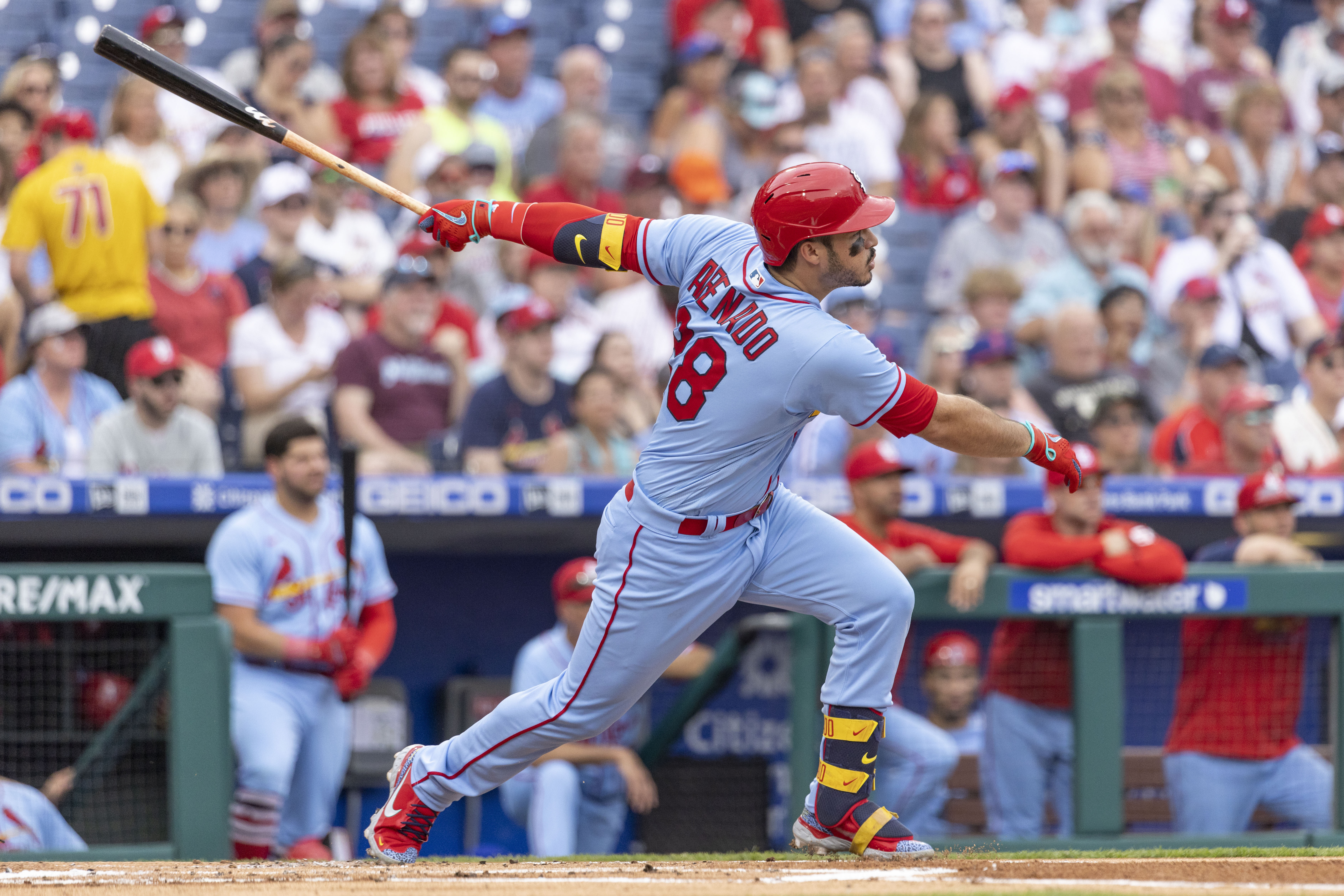 St. Louis Cardinals' Nolan Arenado (28) follows through on a two run home run during the first inning of a baseball game against the Philadelphia Phillies, Saturday, July 2, 2022, in Philadelphia.