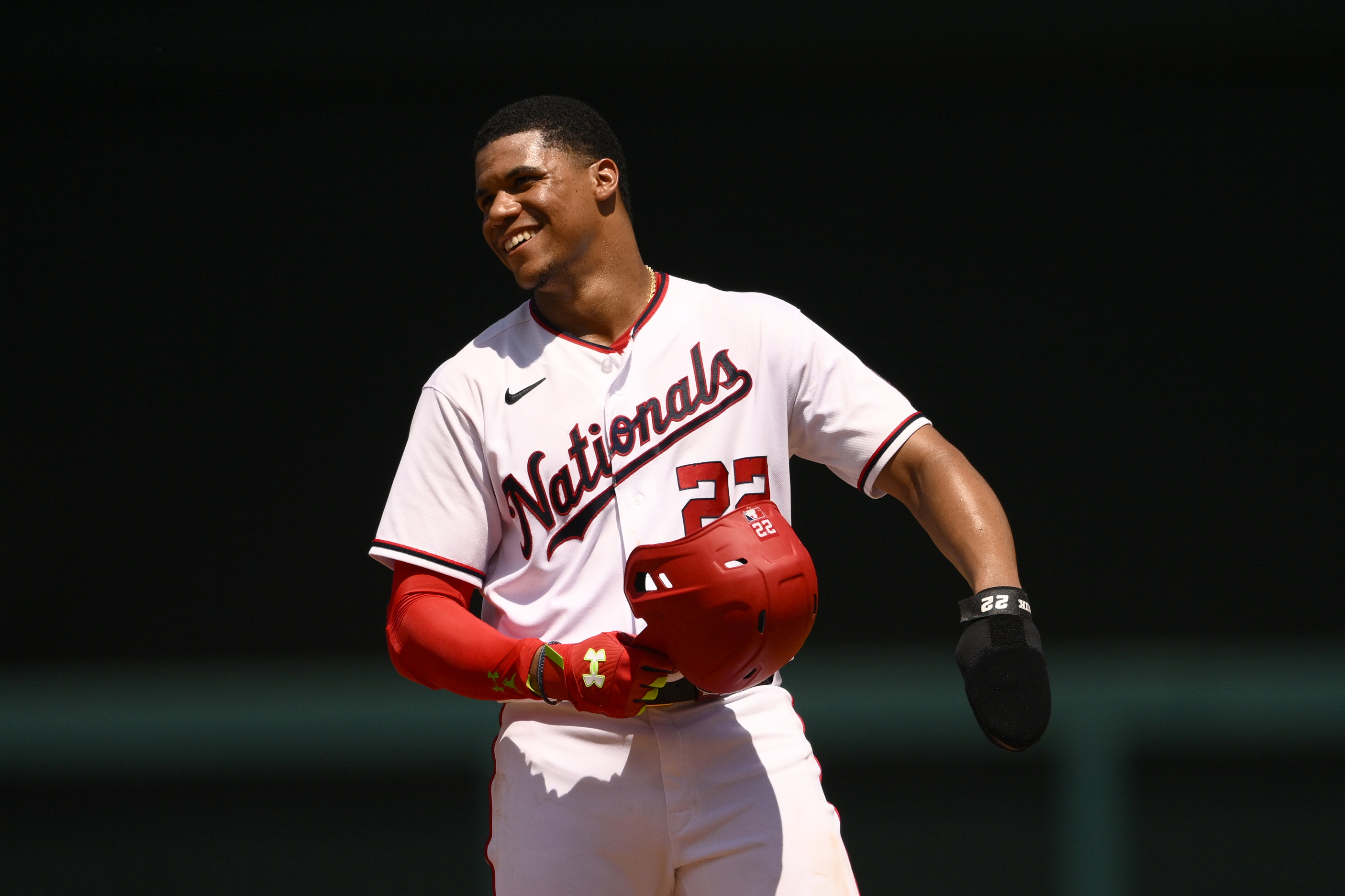 Washington Nationals' Juan Soto smiles as he stands on second during the fourth inning of a baseball game against the Miami Marlins, Sunday, July 3, 2022, in Washington. 