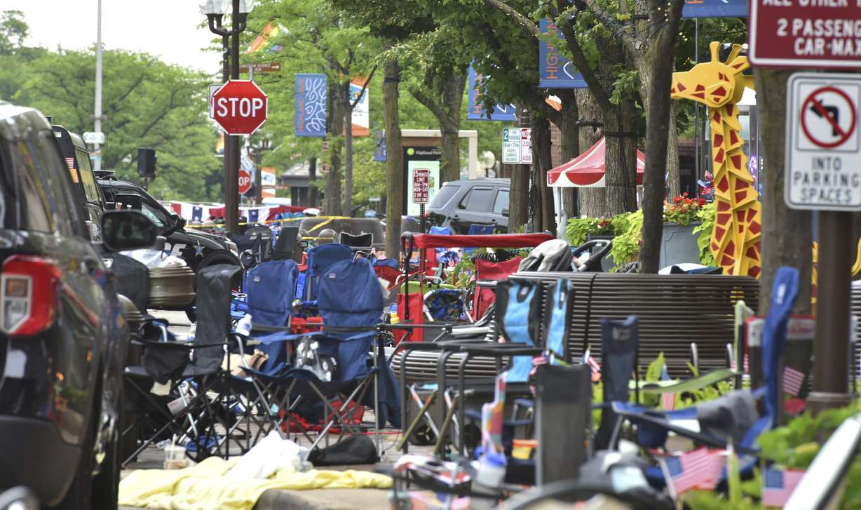 Abandoned chairs on the scene of a mass shooting at a Fourth of July parade on Central Avenue in Highland Park, Ill., on Monday.