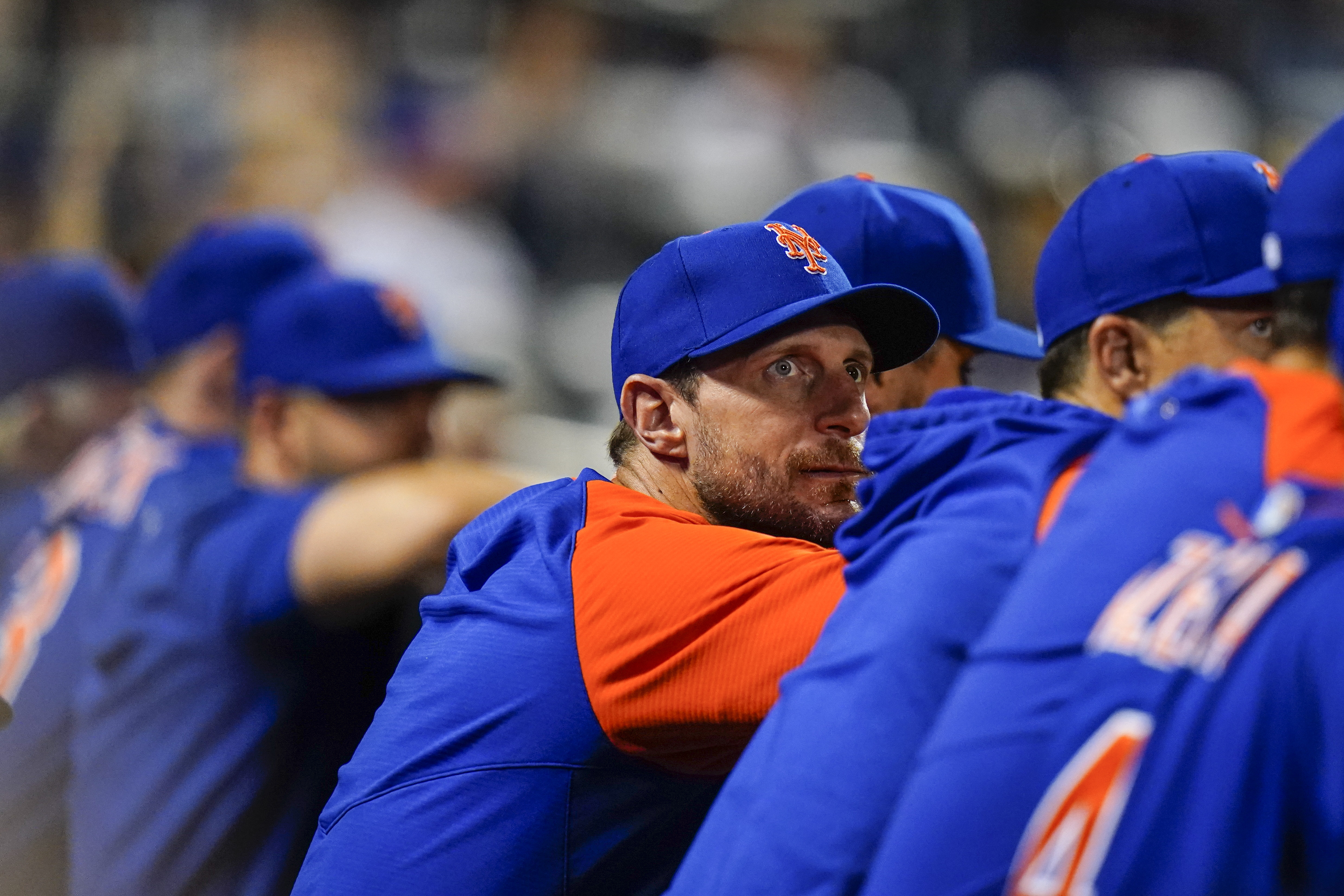 New York Mets pitcher Max Scherzer watches during the eighth inning of a baseball game against the Milwaukee Brewers, Tuesday, June 14, 2022, in New York. 