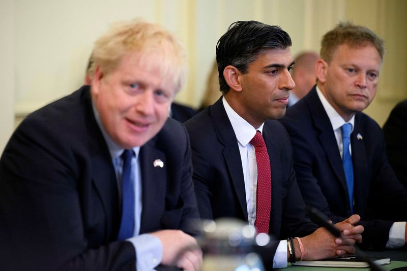 British Chancellor of the Exchequer Rishi Sunak listens as British Prime Minister Boris Johnson addresses his cabinet on the day of the weekly cabinet meeting in Downing Street, London, June 7.