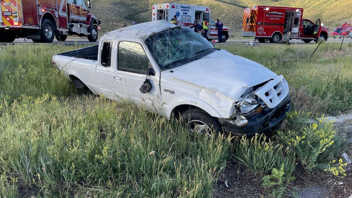A pickup truck is pictured after a crash in Wasatch Couny that killed its driver. The 4th of July weekend was a deadly one on Utah's roads as at least three people died in separate crashes across the state.