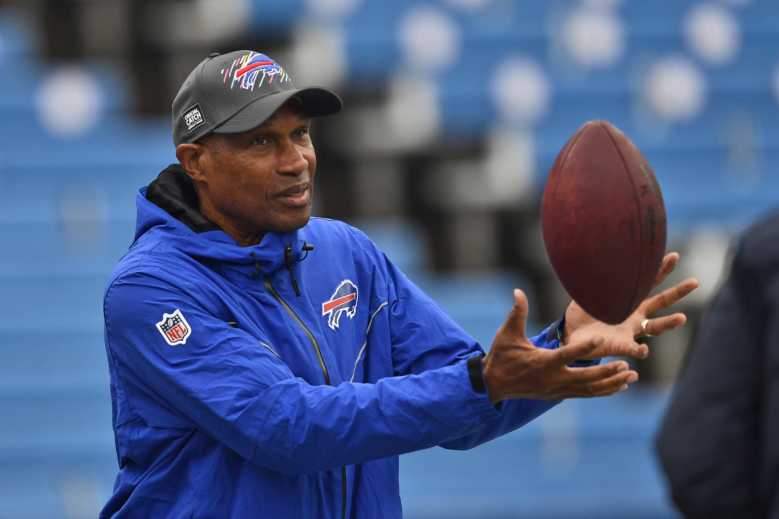 FILE - Buffalo Bills defensive assistant Leslie Frazier catches a ball before an NFL football game against the Houston Texans, Sunday, Oct. 3, 2021, in Orchard Park, N.Y. Leslie Frazier expected another opportunity to be a head coach in the NFL after a three-year-plus stint in Minnesota from 2010-13. Frazier, the Buffalo Bills’ 63-year-old defensive coordinator, is still waiting for that second chance while doing his best to help young coaches advance their careers. 