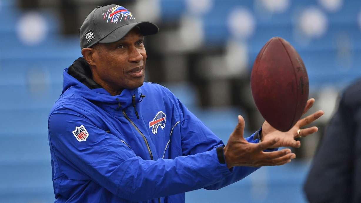 FILE - Buffalo Bills defensive assistant Leslie Frazier catches a ball before an NFL football game against the Houston Texans, Sunday, Oct. 3, 2021, in Orchard Park, N.Y. Leslie Frazier expected another opportunity to be a head coach in the NFL after a three-year-plus stint in Minnesota from 2010-13. Frazier, the Buffalo Bills’ 63-year-old defensive coordinator, is still waiting for that second chance while doing his best to help young coaches advance their careers.