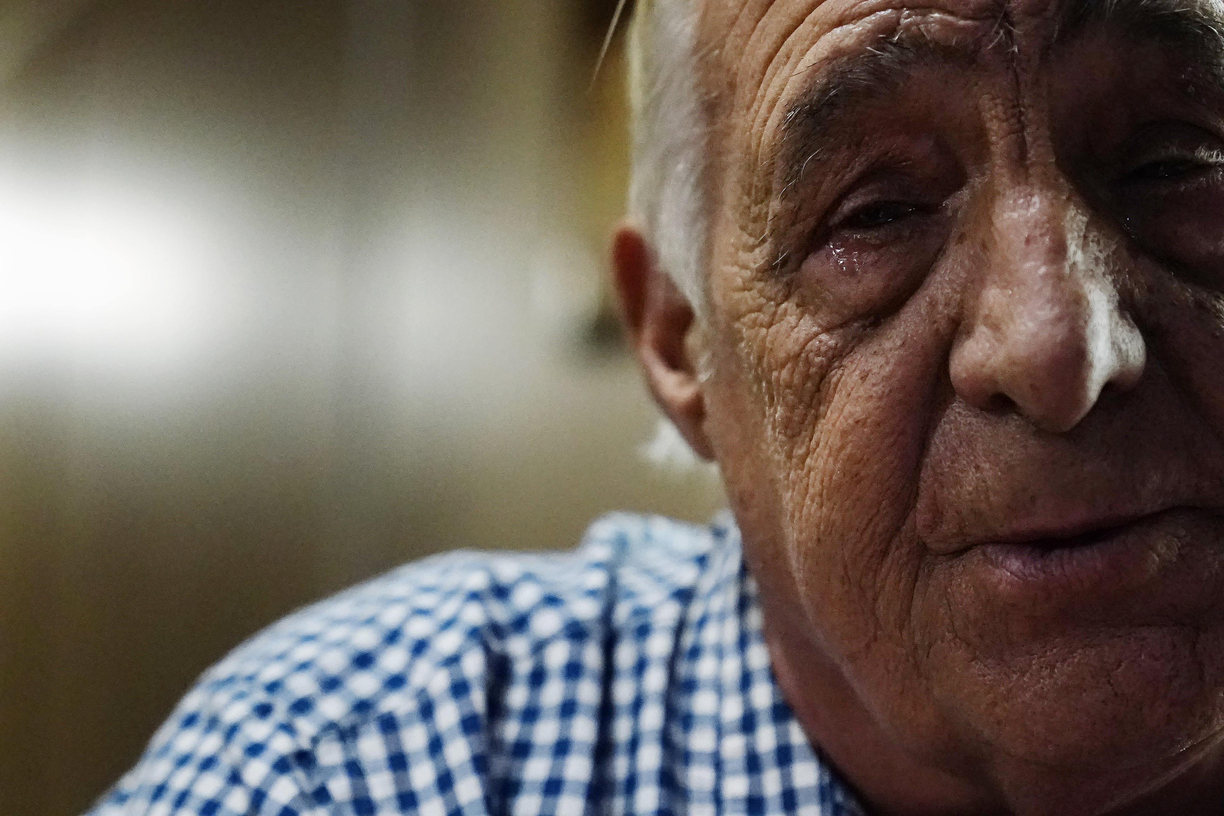 Larry Guess sheds a tear on June 23, in Athens, Ala., as he talks about his son, David Guess, who was killed in March by gun violence.