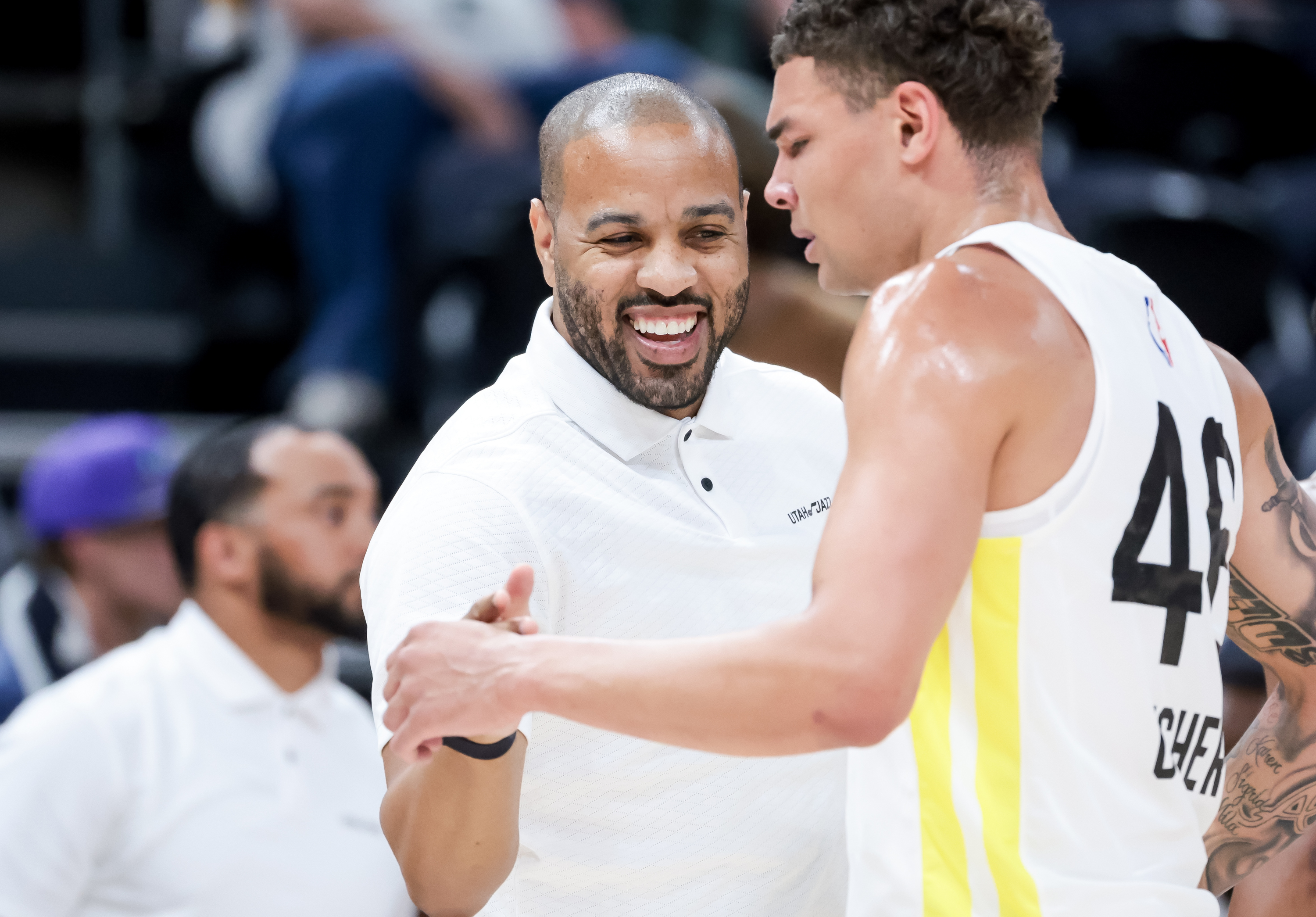Utah Jazz assistant coach Irv Roland high-fives Jordan Usher during a Summer League game between the Utah Jazz and the Oklahoma City Thunder at Vivint Arena in Salt Lake City on Tuesday, July 5, 2022.