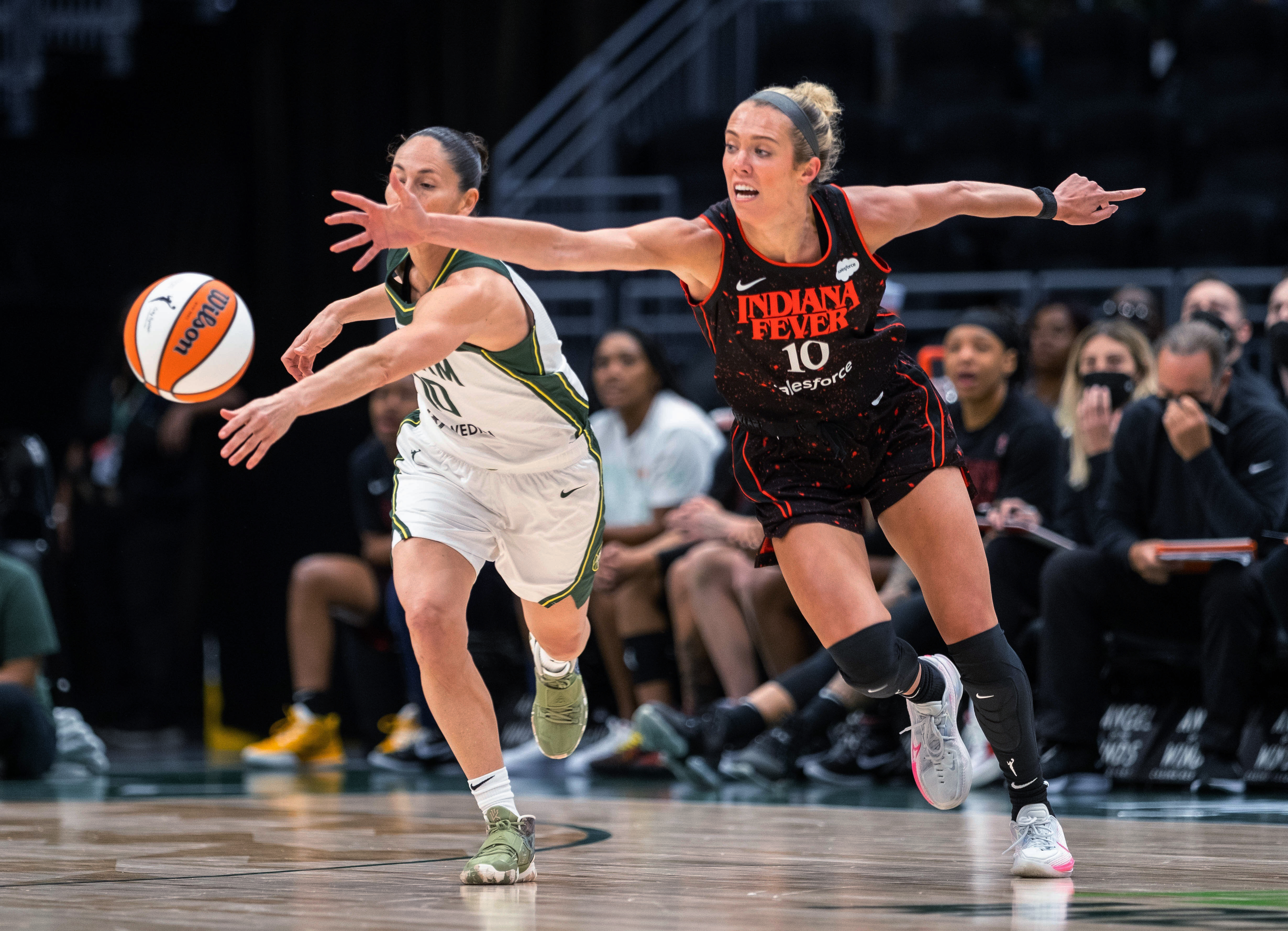 Seattle Storm's Sue Bird knocks the ball away from Indiana Fever's Lexie Hull during the first quarter of a WNBA basketball game Friday, July 1, 2022, in Seattle. 