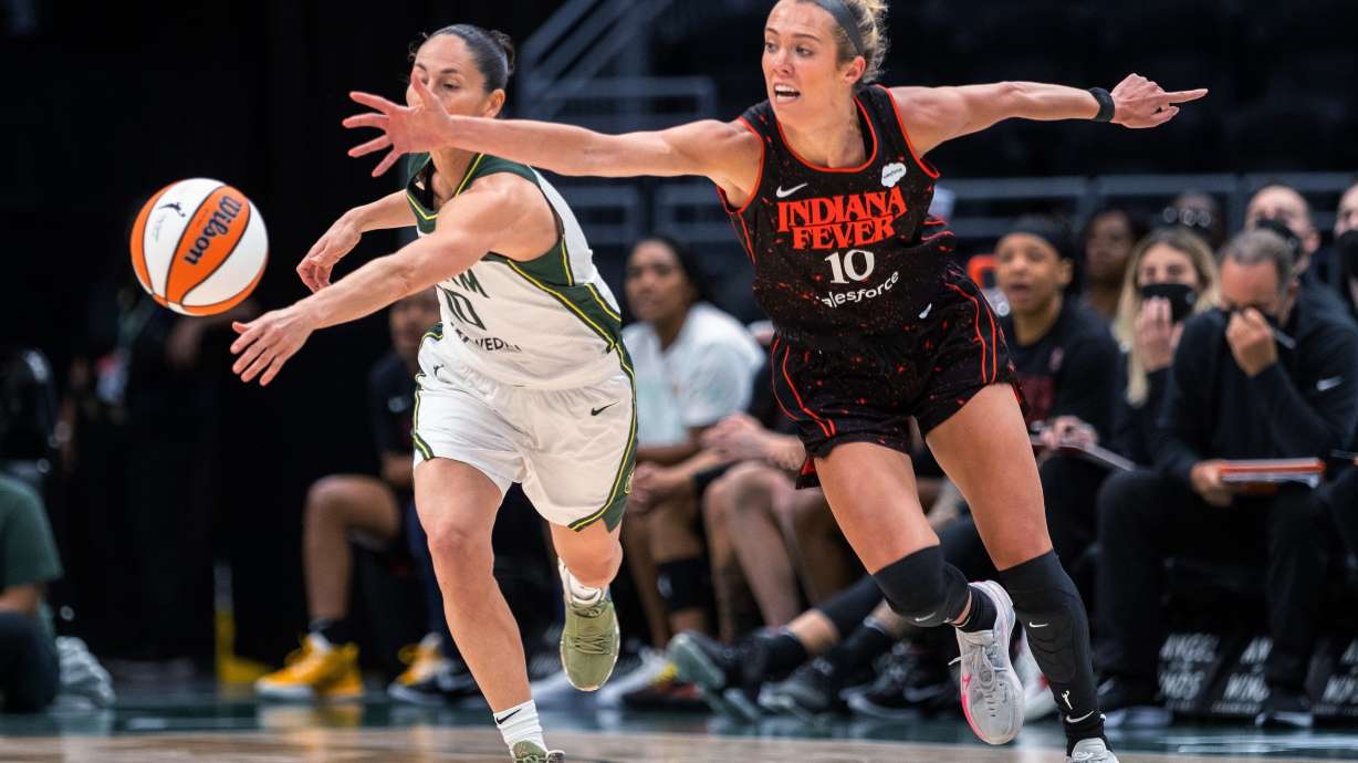 Seattle Storm's Sue Bird knocks the ball away from Indiana Fever's Lexie Hull during the first quarter of a WNBA basketball game Friday, July 1, 2022, in Seattle.