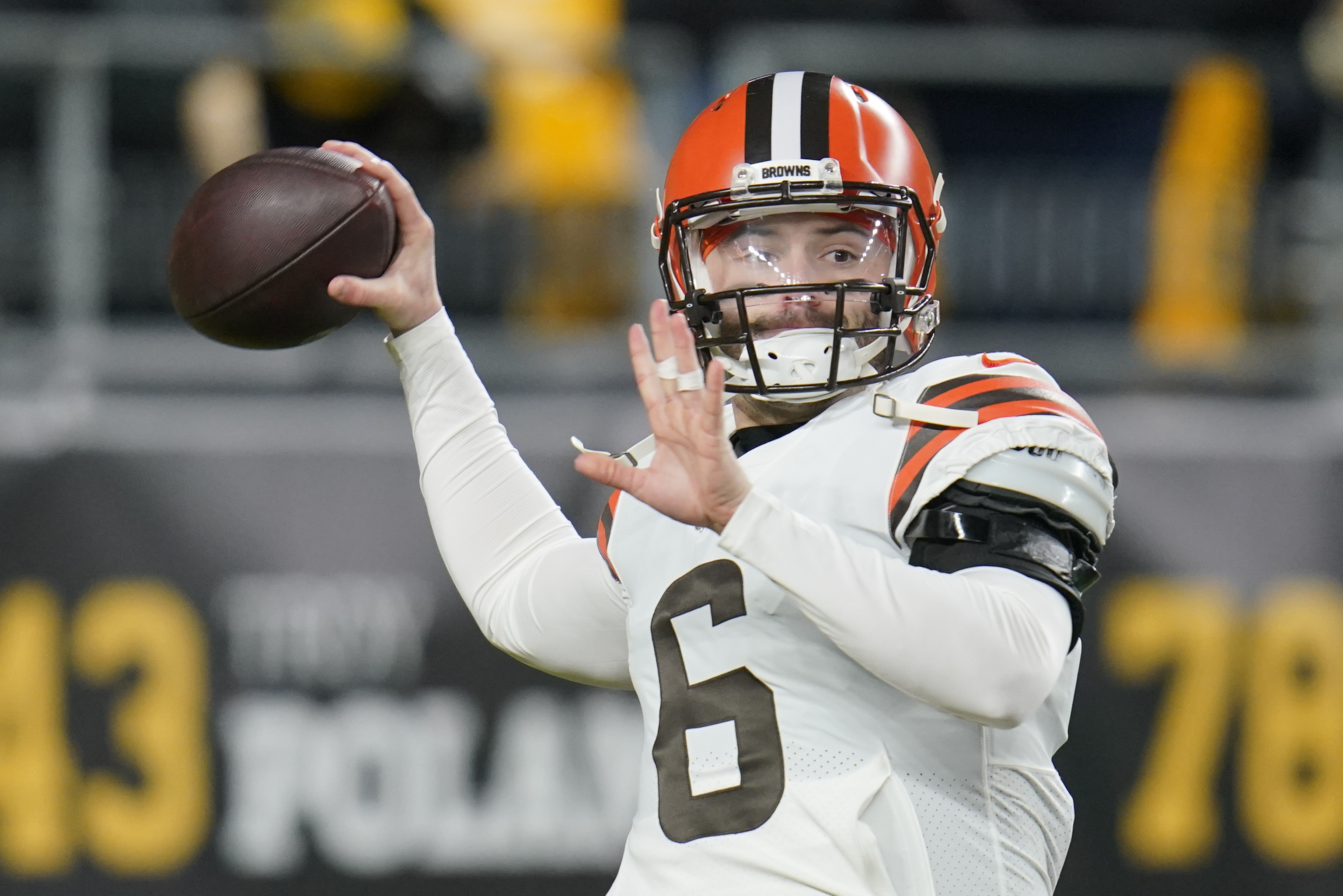 FILE - Cleveland Browns quarterback Baker Mayfield (6) warms up before an NFL football game against the Pittsburgh Steelers, on Jan. 3, 2022, in Pittsburgh. Mayfield's rocky run with Cleveland officially ended Wednesday, July 6, 2022, with the Browns trading the divisive quarterback and former No. 1 overall draft pick to the Carolina Panthers, a person familiar with the deal told the Associated Press. 