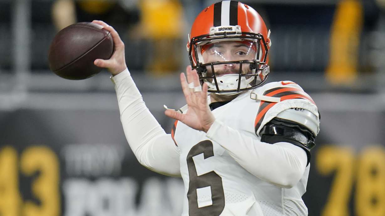 FILE - Cleveland Browns quarterback Baker Mayfield (6) warms up before an NFL football game against the Pittsburgh Steelers, on Jan. 3, 2022, in Pittsburgh. Mayfield's rocky run with Cleveland officially ended Wednesday, July 6, 2022, with the Browns trading the divisive quarterback and former No. 1 overall draft pick to the Carolina Panthers, a person familiar with the deal told the Associated Press.