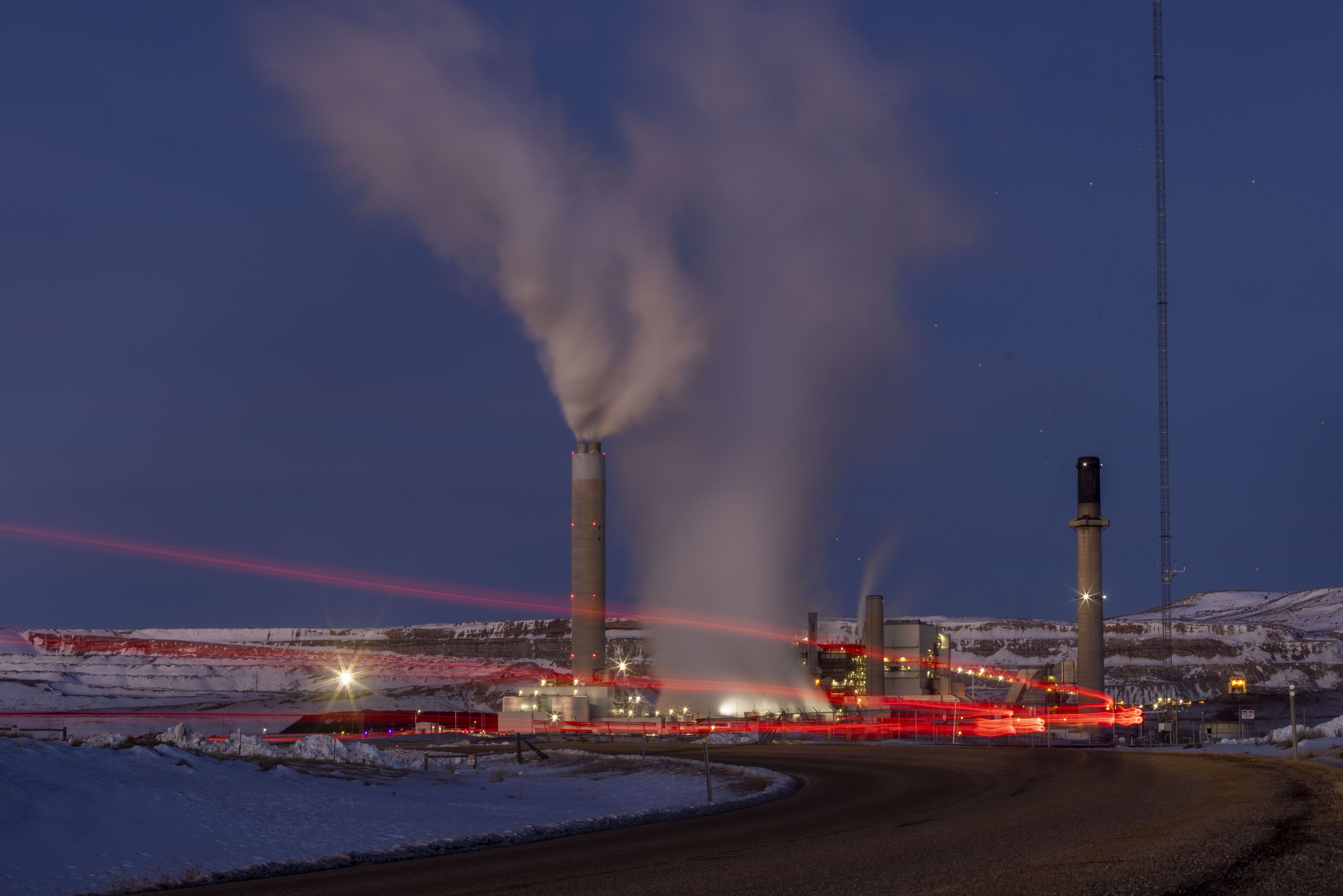 Taillights trace the path of a motor vehicle at the Naughton Power Plant on Jan. 13, in Kemmerer, Wyoming. The European Parliament on Wednesday voted in favor of a new law that will consider natural gas and nuclear projects "green," making them eligible for lost-cost loans and subsidies.