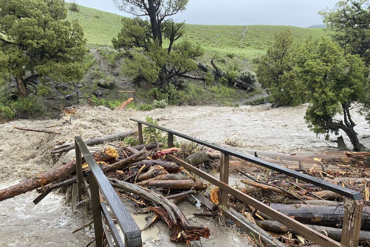 In this photo provided by the National Park Service, is a washed out bridge from flooding at Rescue Creek in Yellowstone National Park, Mont., on June 13.