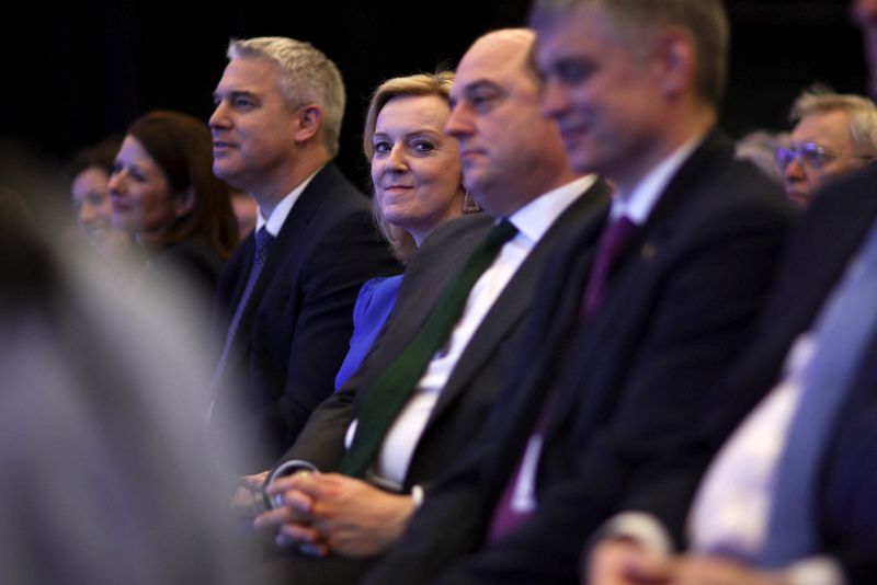 British Foreign Secretary Liz Truss sits with Defence Secretary Ben Wallace and Ukraine's ambassador to the United Kingdom Vadym Prystaiko at the Conservative Party Spring Conference in Blackpool, Britain on March 19.
