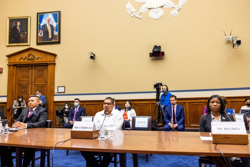 Victims and survivors of gun violence wait to testify before a House Committee on Oversight and Reform hearing on gun violence on Capitol Hill in Washington, June 8. Three gunmakers have been asked to testify on July 20 as part of the committee's investigation.