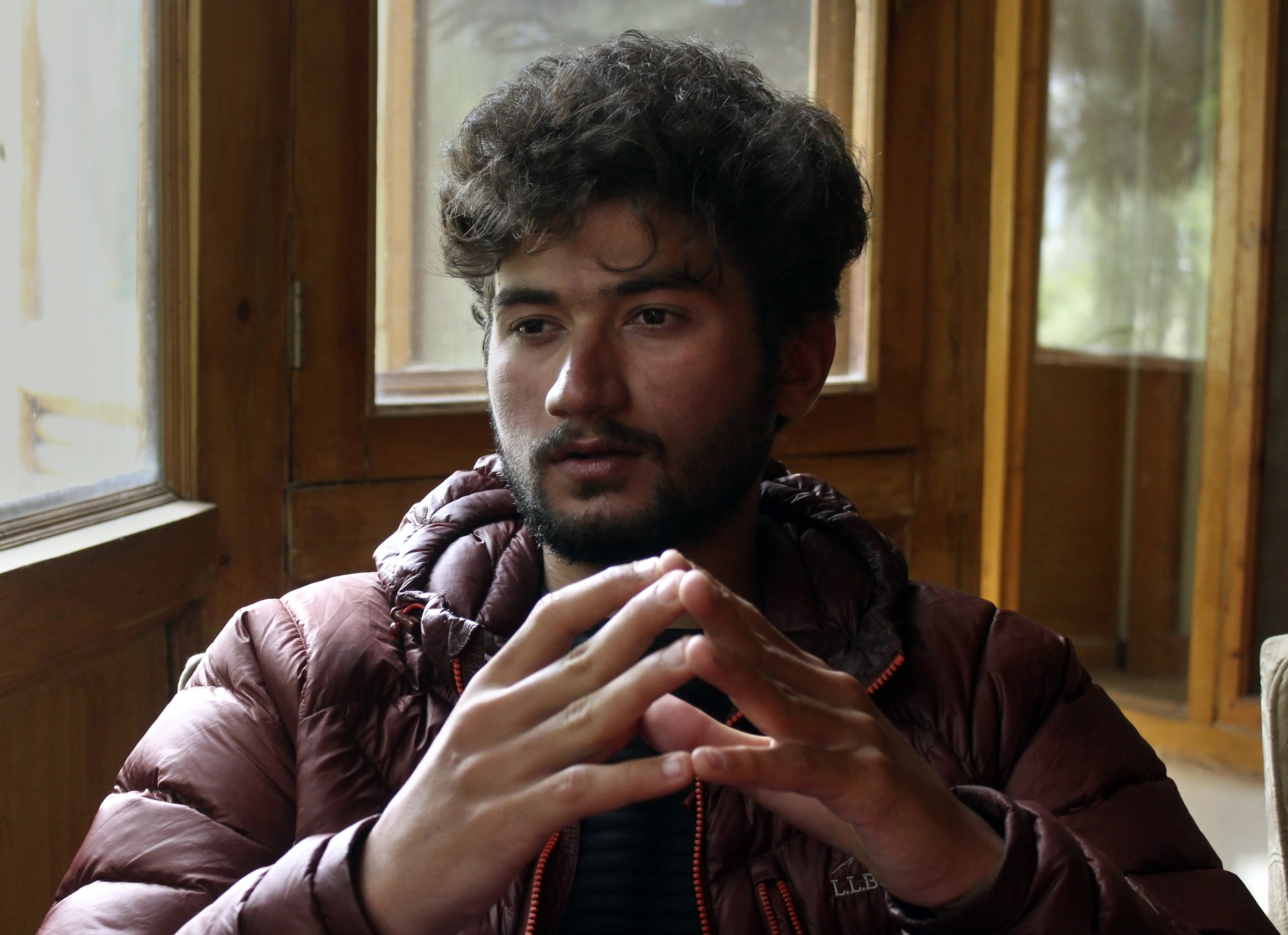 FILE - Pakistani mountain climber Shehroz Kashif, 19, gives an interview to The Associated Press, in Skardu, a town in the Gilgit Baltistan region of northern Pakistan, Sunday, Aug. 1, 2021. Kashif, who became the youngest climber of one of the world's highest mountains is safe after going missing during his latest expedition to another peak, an official said Thursday, July 7, 2022. 