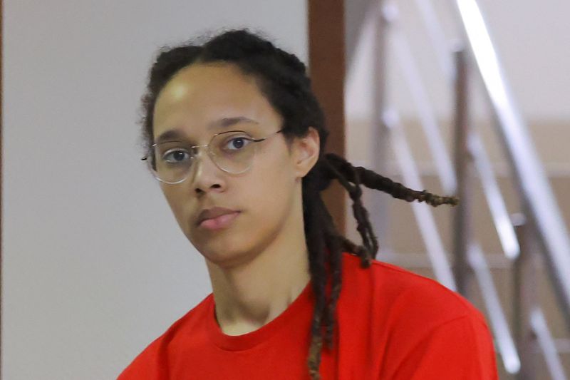 U.S. basketball player Brittney Griner is escorted before a court hearing in Khimki, outside Moscow, Russia Thursday. She pleaded guilty, Russian media and Reuters reported.