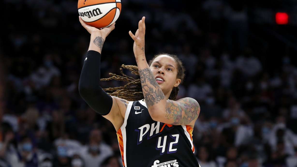 FILE - Phoenix Mercury center Brittney Griner (42) shoots during the first half of Game 1 of the WNBA basketball Finals against the Chicago Sky, on Oct. 10, 2021, in Phoenix. Jailed American basketball star Brittney Griner returns to a Russian court Thursday July 7, 2022, as calls increase for Washington to do more to secure her release. Griner was detained in February at a Moscow airport after vape canisters with cannabis oil allegedly were found in her luggage.