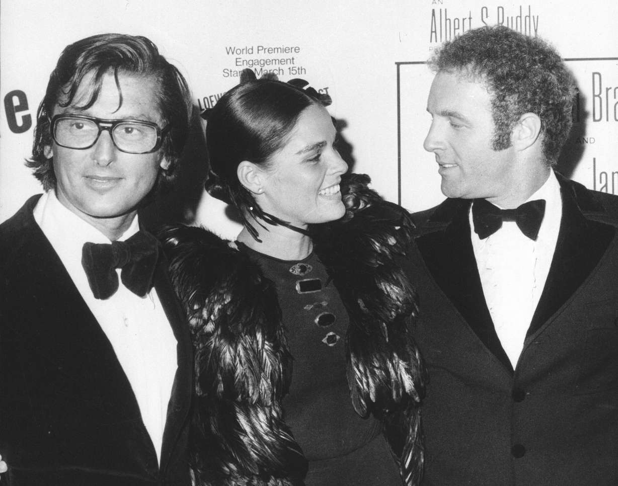 Paramount Pictures vice president Robert Evans, left, actress Ali MacGraw, and actor James Caan, who plays Sonny in "The Godfather," attend the world premiere of "The Godfather," in New York on March 14, 1972.