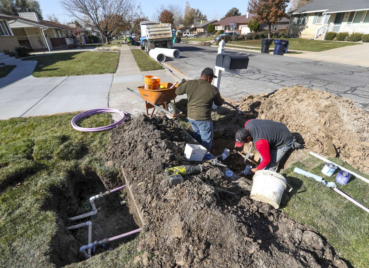 Ormond Construction crews install secondary water meters in a subdivision in Woods Cross for the Weber Basin Water Conservancy District on Nov. 7, 2019. The water district is committed to the conservation of water and will be installing the meters within its service area to promote the efficient and responsible use of the resource. With the new meters, homeowners will be able to see their secondary water consumption use.