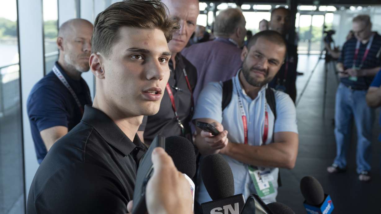 Juraj Slafkovsky, of Slovakia, speaks to reporters at the NHL Draft top hockey prospects media availability, Wednesday, July 6, 2022, in Montreal.