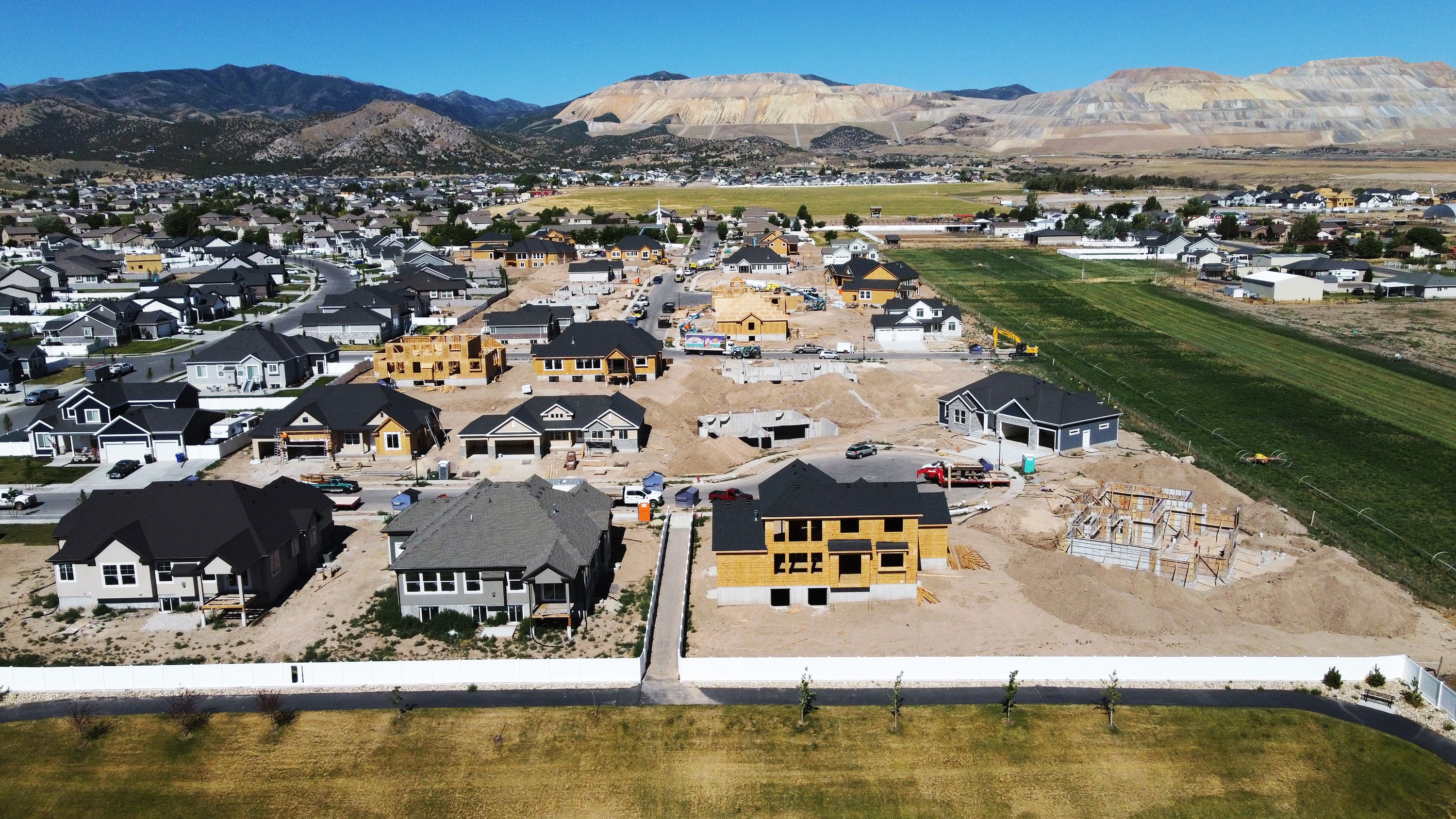 Homes under construction in Herriman are pictured on Tuesday. Researchers at the Federal Reserve recently published a report diving into what caused the COVID-19 pandemic housing market boom and its record housing prices.