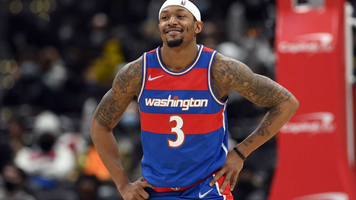 FILE - Washington Wizards guard Bradley Beal (3) looks on during the second half of an NBA basketball game against the Boston Celtics, on Jan. 23, 2022, in Washington. Beal and the Wizards renewed their commitment to each other when he agreed to a five-year deal worth up to $251 million to stay in Washington.