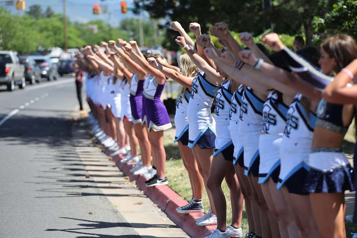 Cheerleaders line up to honor Macie Ann Hill during her funeral procession in Layton on Saturday. Hill was the young cheerleader that died from her injuries after her being ran over during a parade.