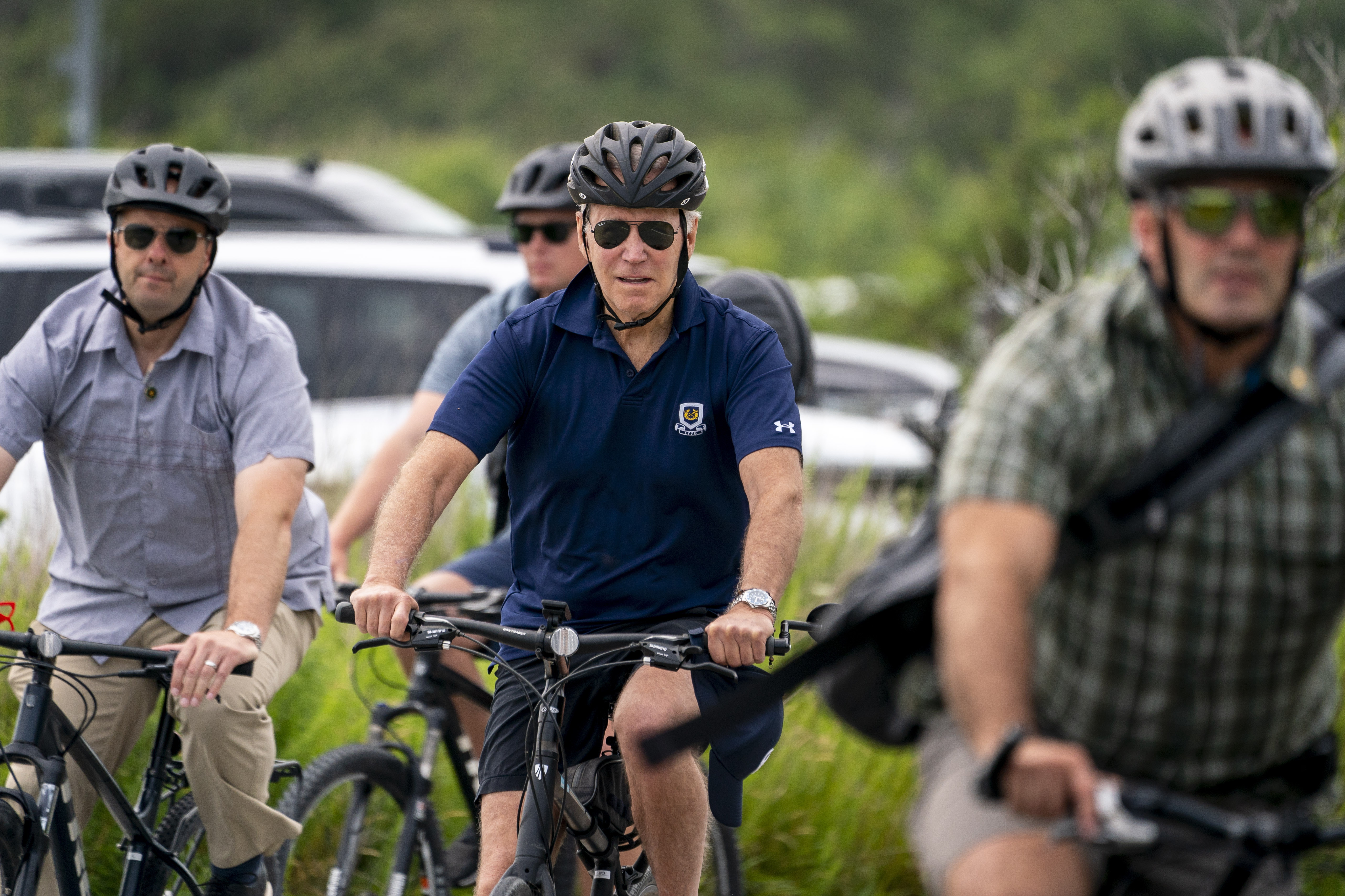 President Joe Biden goes on a bike ride in Gordons Pond State Park in Rehoboth Beach, Del., Sunday.