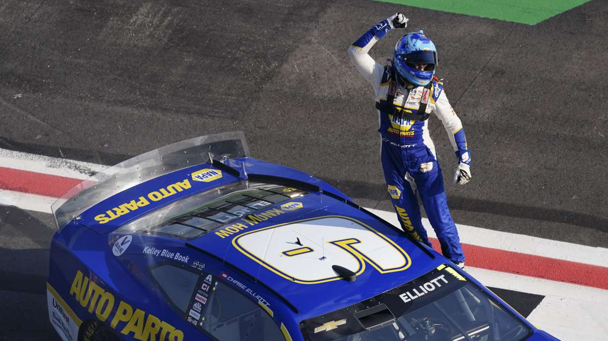 NASCAR Cup Series driver Chase Elliott (9) celebrates after winning a NASCAR Cup Series auto race at Atlanta Motor Speedway, Sunday, July 10, 2022, in Hampton, Ga.