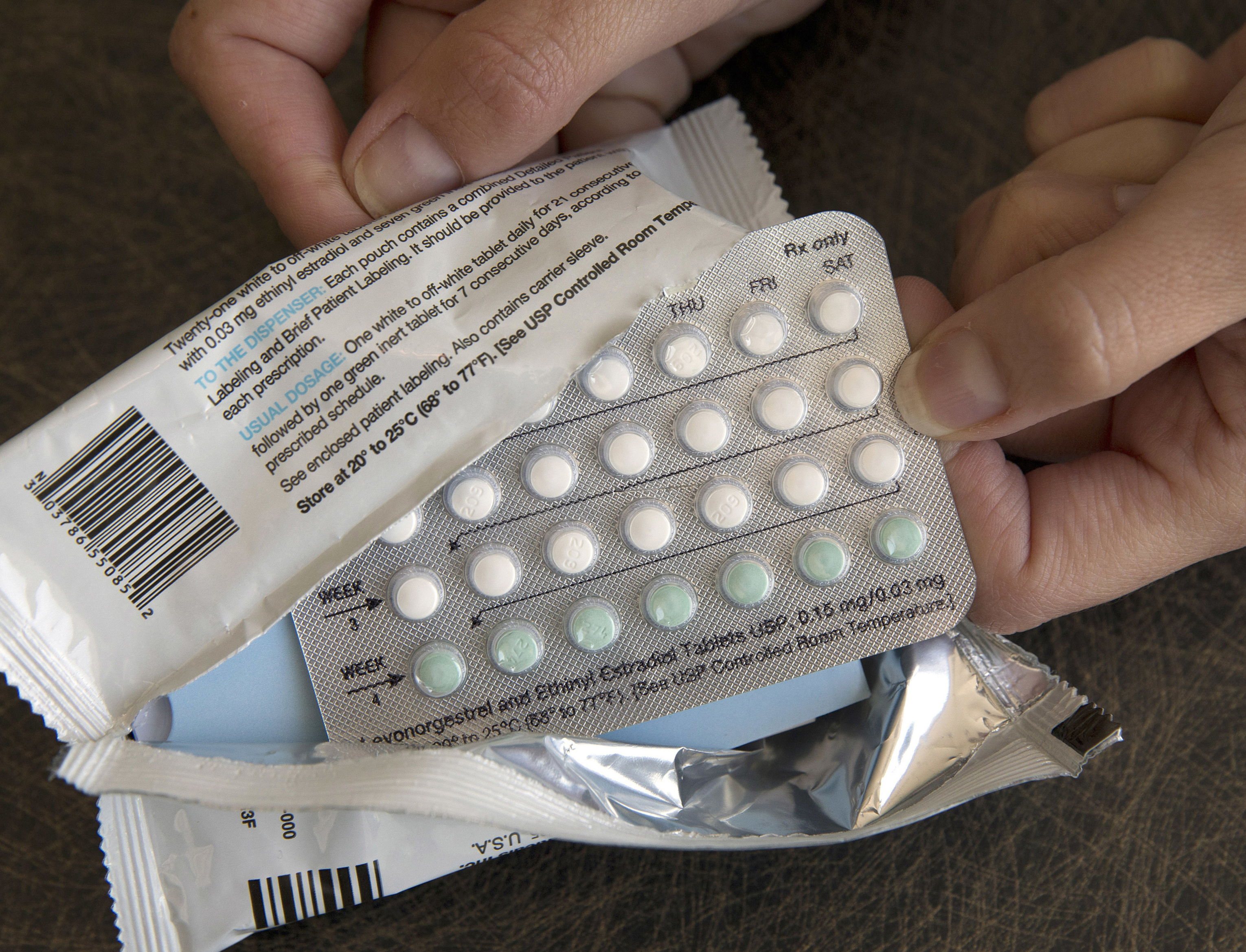 A one-month dosage of hormonal birth control pills is displayed in Sacramento, Calif., Aug. 26, 2016. A drug company is seeking U.S. approval for the first-ever birth control pill that women could buy without a prescription. 