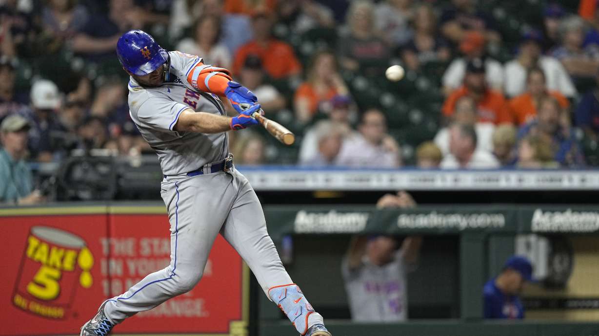 New York Mets' Pete Alonso hits a home run against the Houston Astros during the sixth inning of a baseball game Tuesday, June 21, 2022, in Houston.
