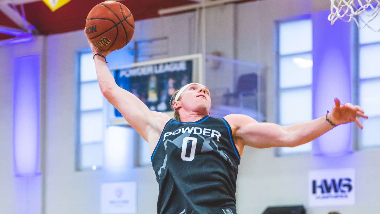 Former BYU guard Hunter Erickson goes to dunk during a Powder League game, Friday, July 9. 2022 at Judge Memorial Catholic High School in Salt Lake City. Erickson recently committed to Salt Lake Community College.