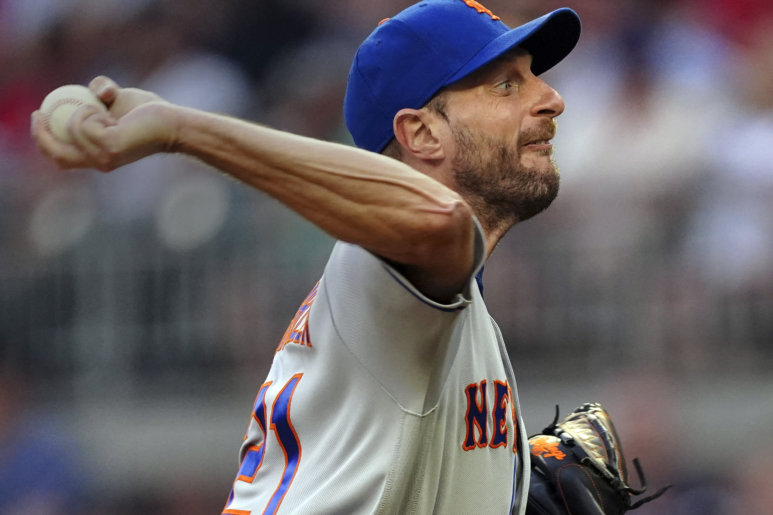 New York Mets starting pitcher Max Scherzer works against the Atlanta Braves in the third inning of a baseball game, Monday, July 11, 2022, in Atlanta. 