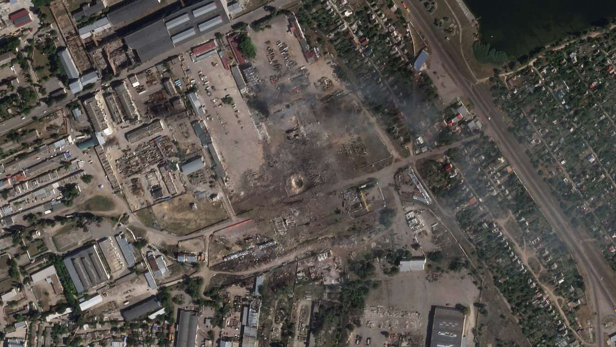 This satellite image from Planet Labs PBC shows the aftermath of a Ukrainian strike on a Russian ammunition depot in Nova Kakhovka, Ukraine, Tuesday.