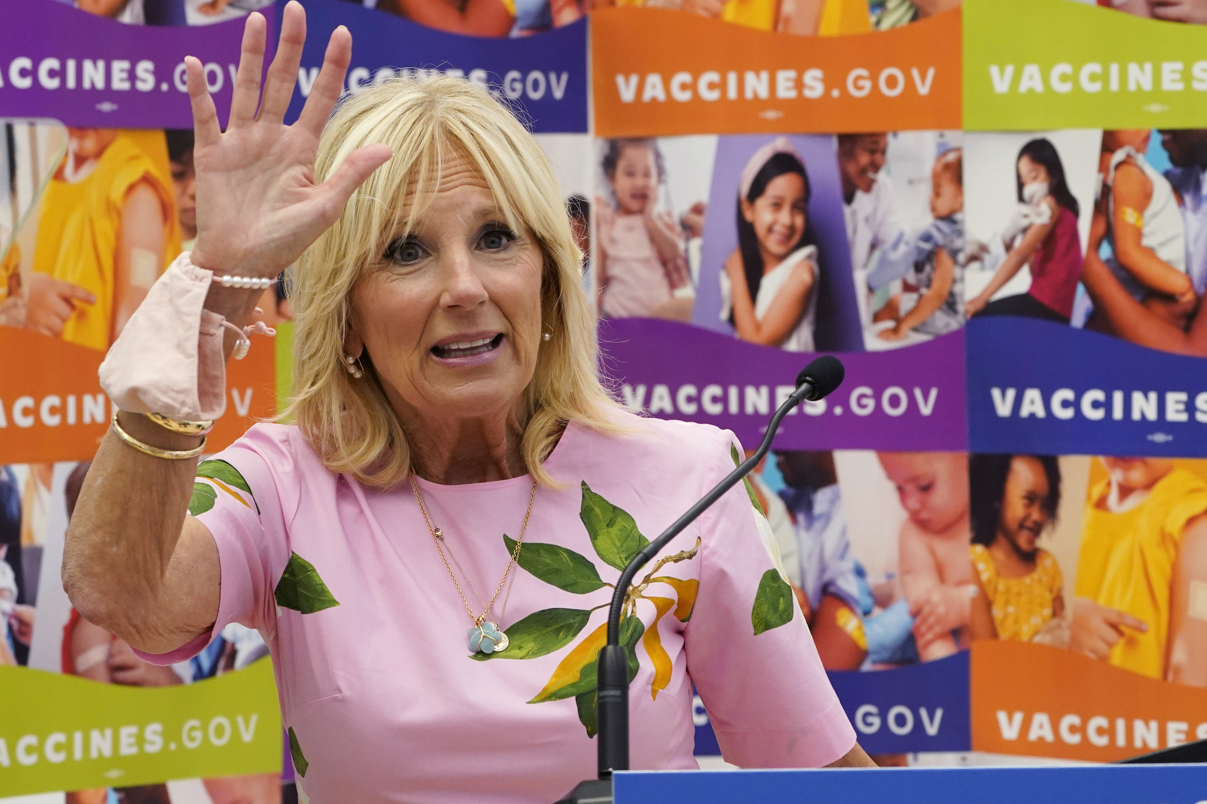 First lady Jill Biden waves as she speaks during a tour of a health facility, July 1 in Richmond, Va. She is apologizing for saying Latinos are “as unique” as San Antonio breakfast tacos. 