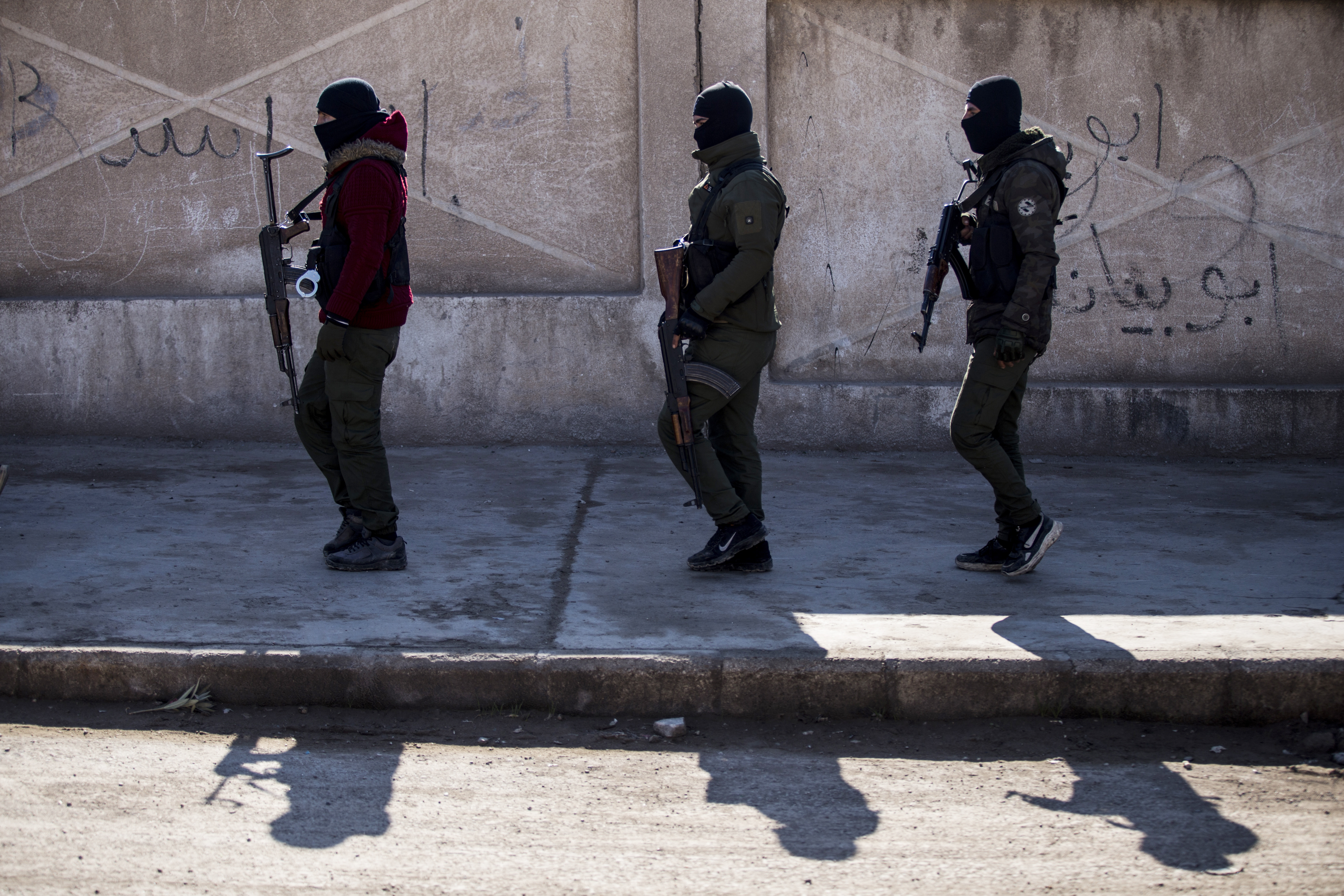 U.S. backed Syrian Democratic Forces soldiers search for Islamic State militants in Hassakeh, Syria, Jan. 28. The Pentagon says it killed a leader of the Islamic State in Syria in a drone strike Tuesday.