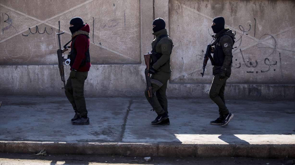 U.S. backed Syrian Democratic Forces soldiers search for Islamic State militants in Hassakeh, Syria, Jan. 28. The Pentagon says it killed a leader of the Islamic State in Syria in a drone strike Tuesday.