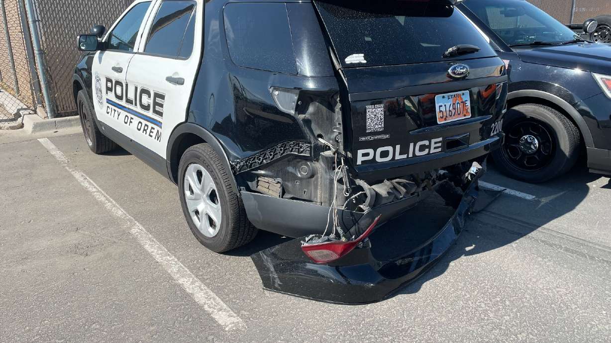 An Orem police officer went to the hospital with injuries and was later released late Monday after getting hit by a vehicle while helping another driver. Officers say a civilian vehicle hit the back of one patrol vehicle, pushing it into the second vehicle and the officer was hit while trying to jump out of the way.