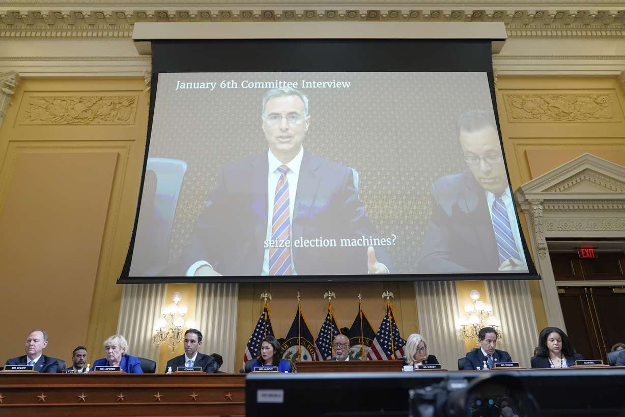 A video of Pat Cipollone, former White House counsel, is displayed as the House select committee investigating the Jan. 6 attack on the U.S. Capitol holds a hearing at the Capitol in Washington, Tuesday.