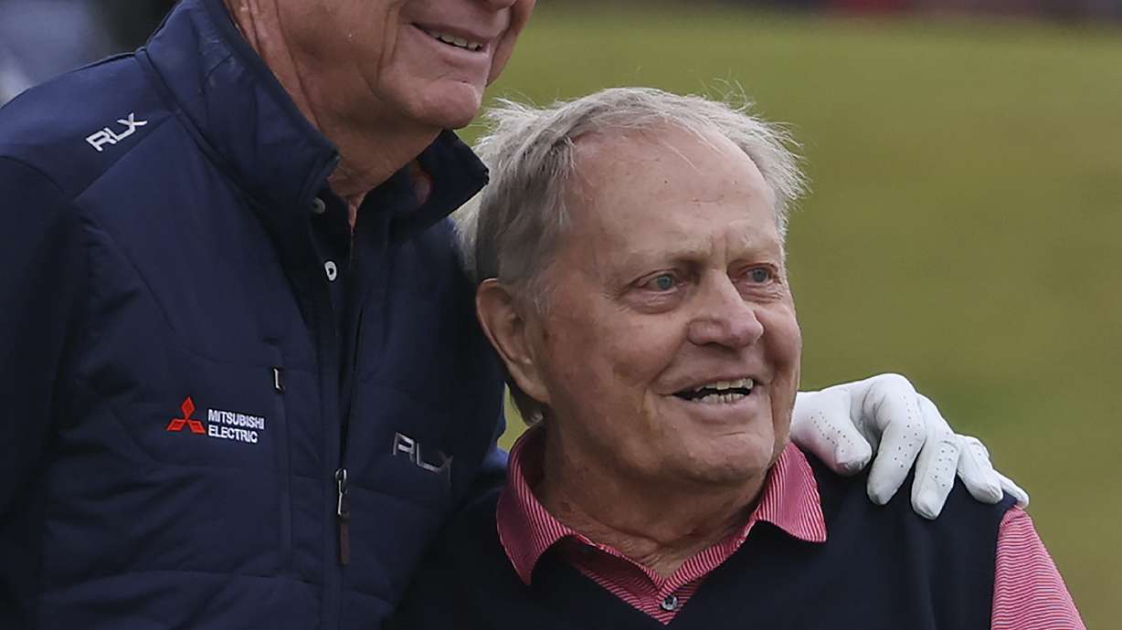 Golf legends Jack Nicklaus, right, and Tom Watson of United States pose for a photo during a 'Champions round' as preparations continue for the British Open golf championship on the Old Course at St. Andrews, Scotland, Monday July 11, 2022. The Open Championship returns to the home of golf on July 14-17, 2022, to celebrate the 150th edition of the sport's oldest championship, which dates to 1860 and was first played at St. Andrews in 1873.