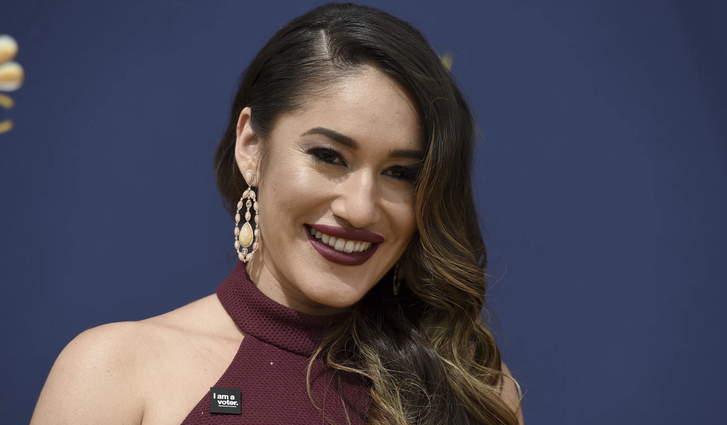 Q’orianka Kilcher arrives at the 70th Primetime Emmy Awards on Sept. 17, 2018, in Los Angeles. “Yellowstone” actor Kilcher has been charged with illegally collecting nearly $97,000 in disability benefits while working on the TV show, authorities announced on Monday.